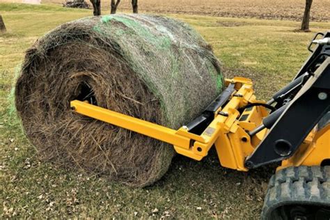 hay unroller skid steer|40x40 round bale unroller.